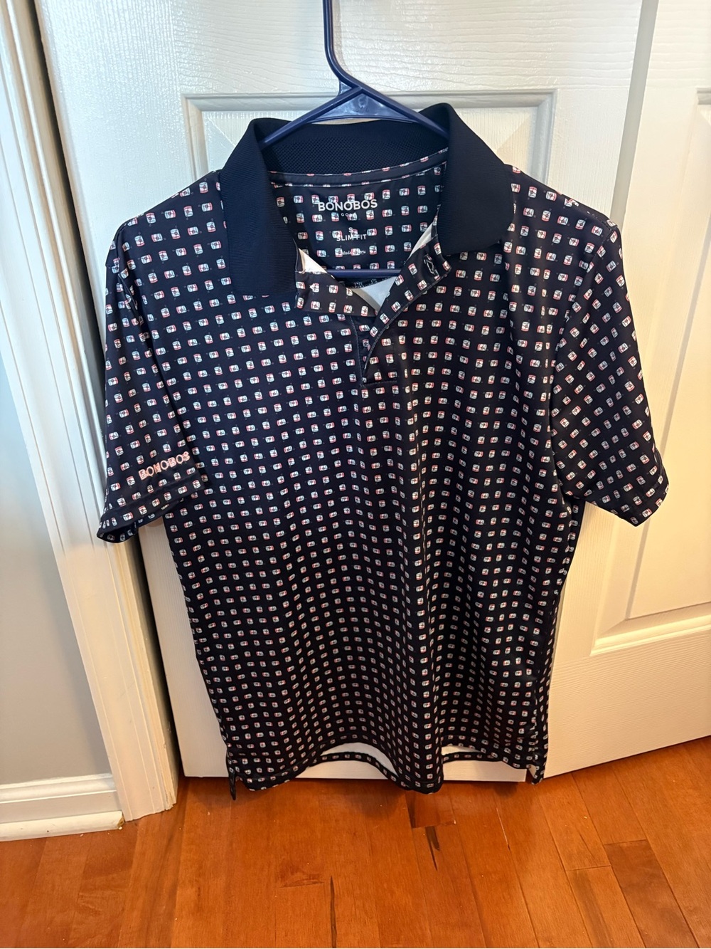 Bonobos Navy Polo with Petite Orange & Blue Floral Pattern